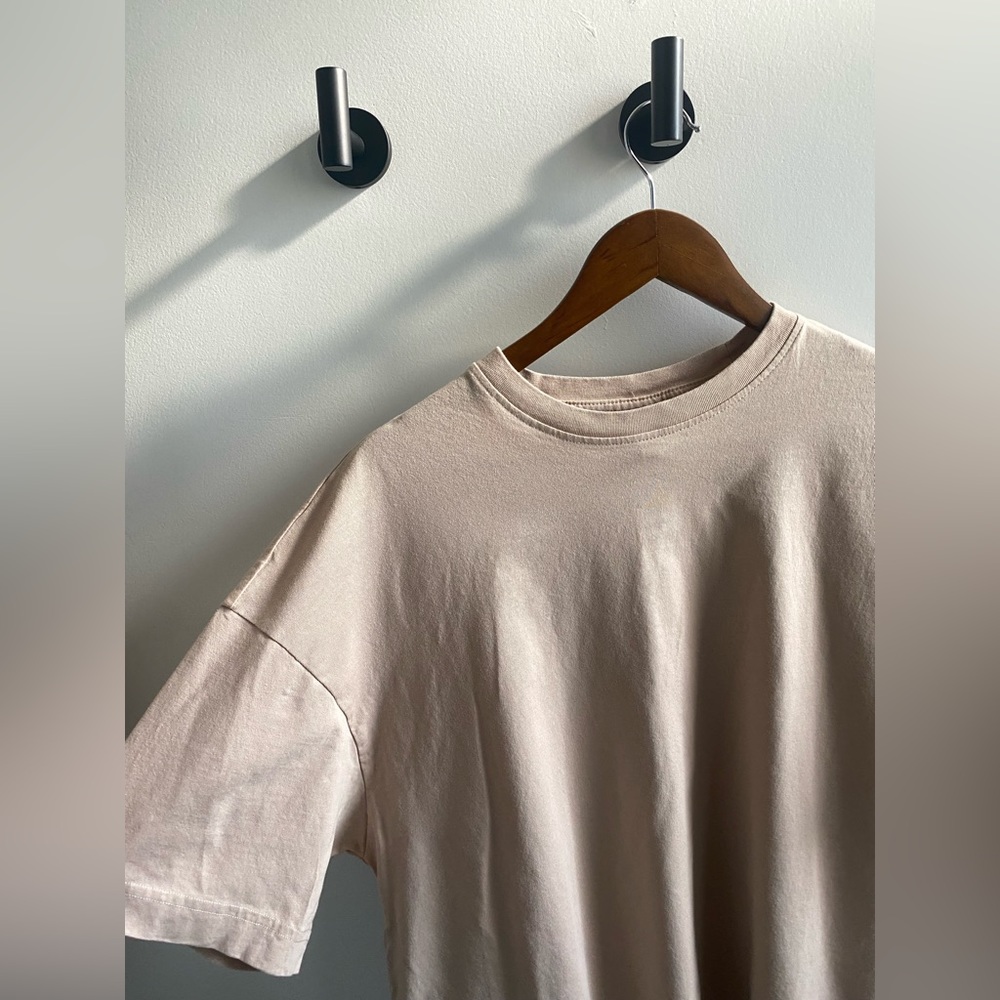 H and M 100% cotton shirt drop shoulder. Size M.014.